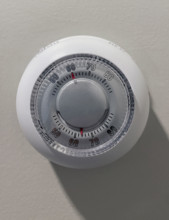 Old-fashioned Wall thermostat