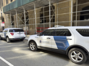 U.S. Customs and Border Protection cars parked on street, New York City