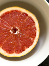 High angle view of grapefruit half in bowl