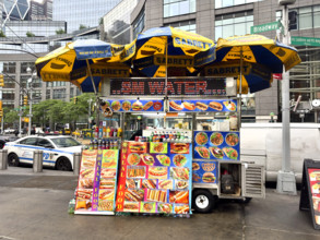 Food and drink cart on city street, New York City