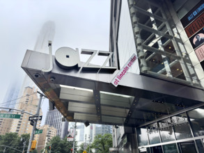 Jazz at Lincoln Center sign attached to awning  at entrance to The Shops at Columbus Circle, Manhattan, New York City