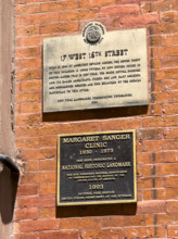 Building exterior with plaque designating it as a National Historic Landmark for its Greek Revival architecture and as the former site of the Margaret Sanger Clinic, 17 West 16th Street, Manhattan, Ne...
