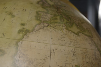 West Africa and Sahara Desert on vintage globe with Mediterranean Sea and Western Europe above, Atlantic Ocean on left
