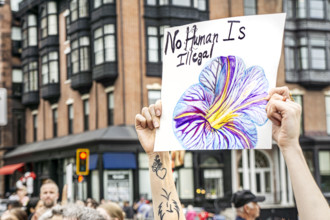 Immigrant rights supporters attending Anti- ICE protest, Boston State House, May 17, 2025,