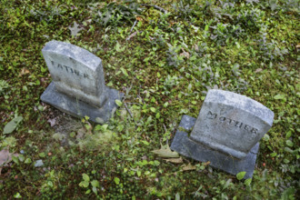High angle view of matching gravestones for Father and Mother