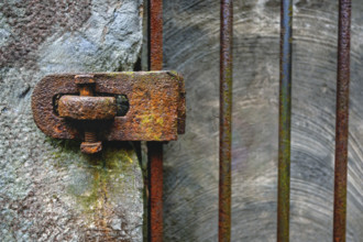 Heavily rusted latch on gate