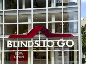 Blinds To Go retail store, company name and logo on building exterior, Seventh Avenue, Manhattan,