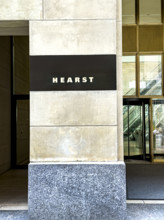 Hearst Tower, building exterior detail with company name on façade, 959 Eighth Avenue, Manhattan,