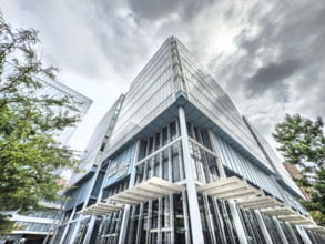 Jerome L. Greene Science Center, Columbia University, building exterior against ominous gray sky,