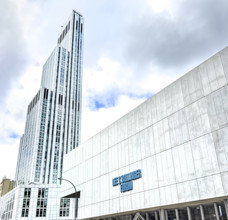 Lee C. Bullinger Forum with 34-story residential tower in background, Columbia University,