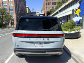 Rear view of Rivian electric SUV and showroom exterior, 461 West 14th Street, Meatpacking District,