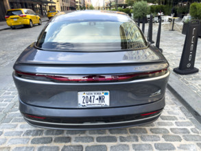 Lucid electric vehicle parked on street in front of showroom, Meatpacking District, Manhattan, New