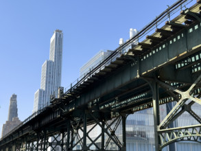 Cityscape including 34-story residential tower and elevated subway, Columbia University,