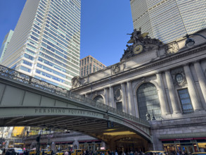 Grand Central Terminal, exterior building detail with view of Park Avenue Viaduct and street scene,
