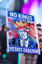 Demonstrators participating in "No Kings" Protest March, Times Square, Manhattan, New York City,