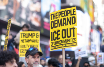 Demonstrators participating in "No Kings" Protest March, Times Square, Manhattan, New York City,