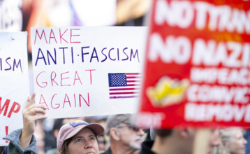 Demonstrators participating in "No Kings" Protest March, Times Square, Manhattan, New York City,