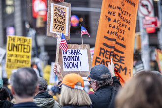Demonstrators participating in "No Kings" Protest March, Times Square, Manhattan, New York City,