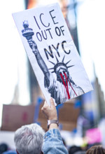 Demonstrators participating in "No Kings" Protest March, Times Square, Manhattan, New York City,