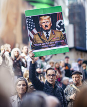 Demonstrators participating in "No Kings" Protest March, Times Square, Manhattan, New York City,