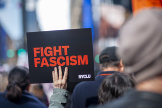 Demonstrators participating in "No Kings" Protest March, Times Square, Manhattan, New York City,