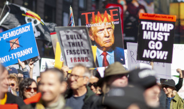 Demonstrators participating in "No Kings" Protest March, Times Square, Manhattan, New York City,