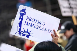 Demonstrators participating in "No Kings" Protest March, Times Square, Manhattan, New York City,