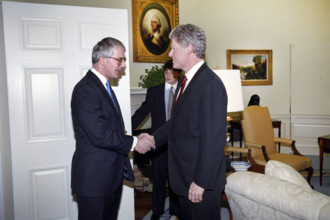 U.S. President Bill Clinton shaking hands with British Prime Minister John Major, Oval Office,