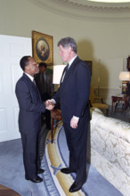 U.S. President Bill Clinton shaking hands with Haitian President Jean-Bertrand Aristide in the Oval