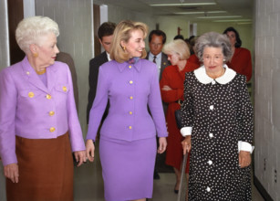 U.S. First Lady Hillary Rodham Clinton (center) walking with Texas Governor Ann Richards (left) and