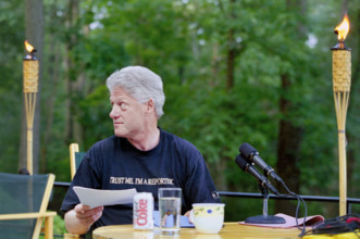 U.S. President Bill Clinton delivering a radio address at Camp David during the Israeli/Palestinian