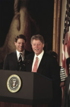 U.S. President Bill Clinton and U.S. Vice President Al Gore standing at podium after swearing-in