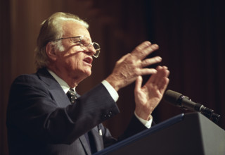 American evangelist Billy Graham speaking at annual National Prayer Breakfast, Washington, D.C.,