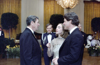 U.S. President Ronald Reagan with Arkansas Governor Bill Clinton and his wife Hillary Clinton at a