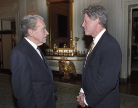 U.S. President Bill Clinton meeting with former U.S. President Richard Nixon in private residence,