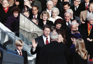 U.S. Vice President-Elect Al Gore being sworn-in by Chief Justice of the U.S. William Rehnquist, as
