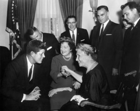 U.S. President John F. Kennedy meeting with Helen Keller (seated right), as her personal secretary