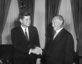 U.S. President John F. Kennedy shaking hands with West German Chancelor Konrad Adenauer in the oval