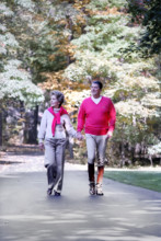 U.S. President Ronald Reagan and U.S. First Lady Nancy Reagan walking at Camp David, Frederick