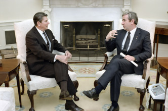 U.S. President Ronald Reagan Meeting with Jerry Falwell in Oval Office of the White House,