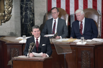 U.S. President Ronald Reagan, U.S. Vice President George H.W. Bush and Speaker of the House Tip