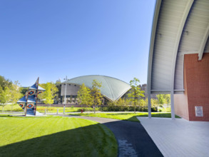 Edward and Joyce Linde Music Building (partial foreground), Kresge Auditorium (background),