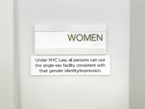 Sign for public bathroom allowing all persons the right to use single-sex facility consistent with