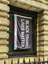 Black Trans Lives Matter banner hanging from building exterior, Greenwich Village, Manhattan, New
