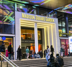 Crowd outside Madison Square Garden entrance at night, Seventh Avenue, Manhattan, New York City,