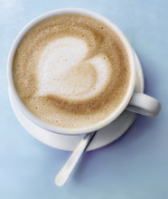 High angle view of Cappuccino foam with heart design