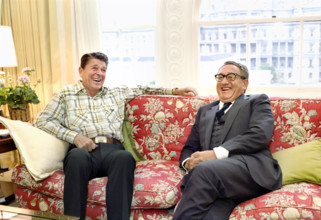 U.S. President Ronald Reagan meeting with former U.S. Secretary of State Henry Kissinger in the