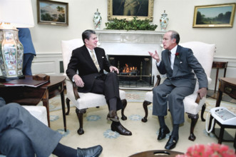 U.S. President Ronald Reagan meeting with Canadian Prime Minister Pierre Trudeau in the Oval Office