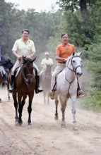 U.S. President Ronald Reagan and U.S. Vice President George H.W. Bush horseback riding, Quantico,