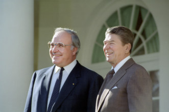 U.S. President Ronald Reagan and Chancellor Helmut Kohl of The Federal Republic of Germany greeting
